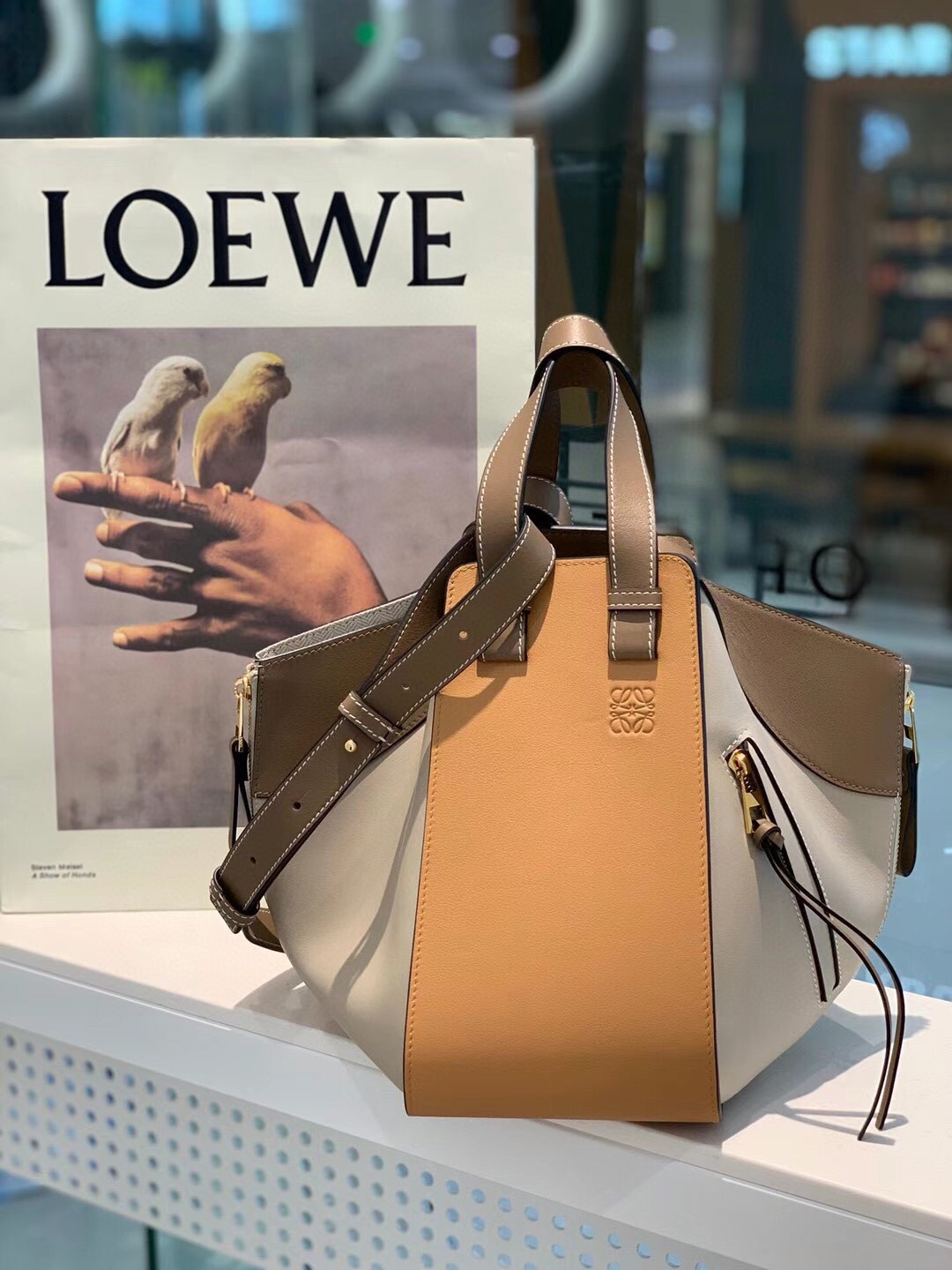 L0ew* Women's Compact Hammock Leather Handbag